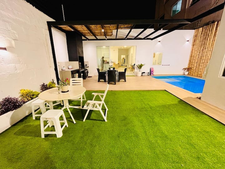 Vacation home with a pool and air conditioning