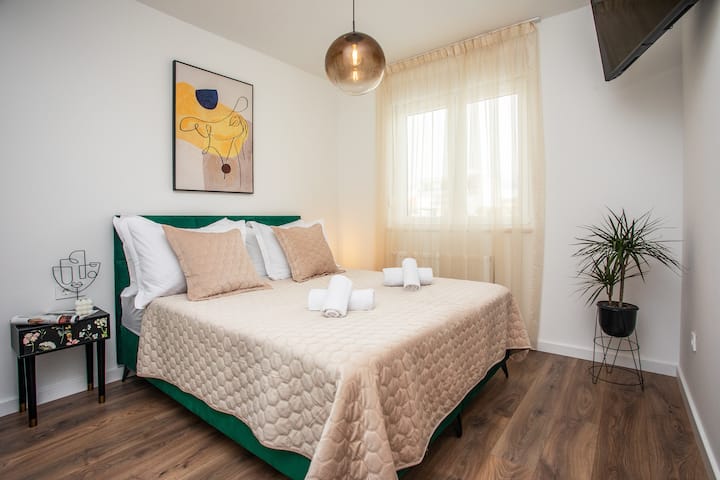 Modern, cozy second bedroom.