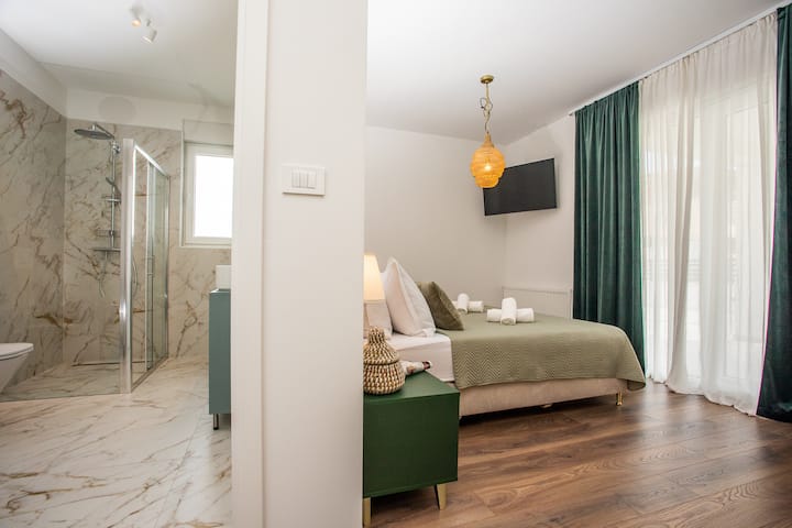 Cozy bedroom with ensuite bathroom.