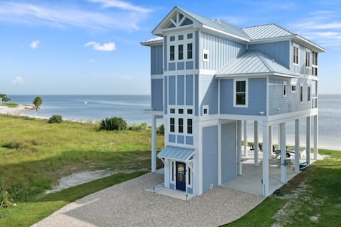 New beach house on the sand, with boat lift