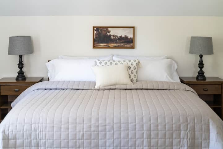 Nelly's Oasis // Bedroom 1 - king bed with private full bath