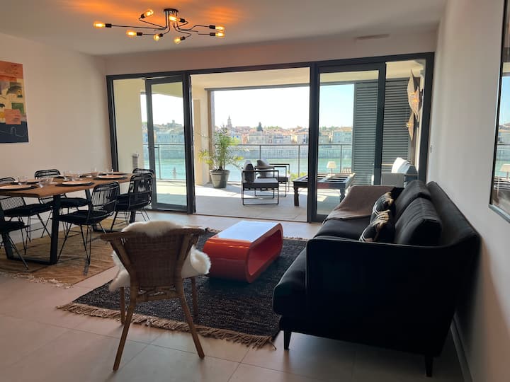 view of the Rhone and its Arlesian roofs Flats for Rent in Arles, ProvenceAlpes