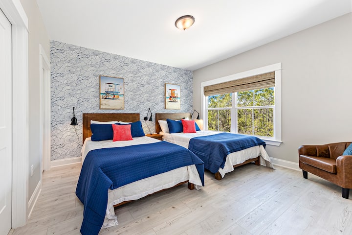 Bedroom 3 has two double beds and the greatest wave wallpaper!  love this room!