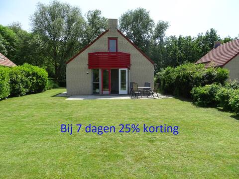 Sunny garden unobstructed views of beach and swimming water