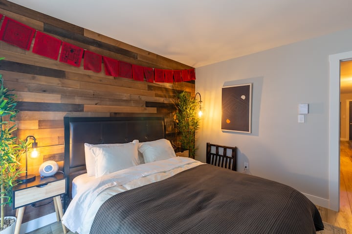 Nightstand alarm clock has white noise functionality.