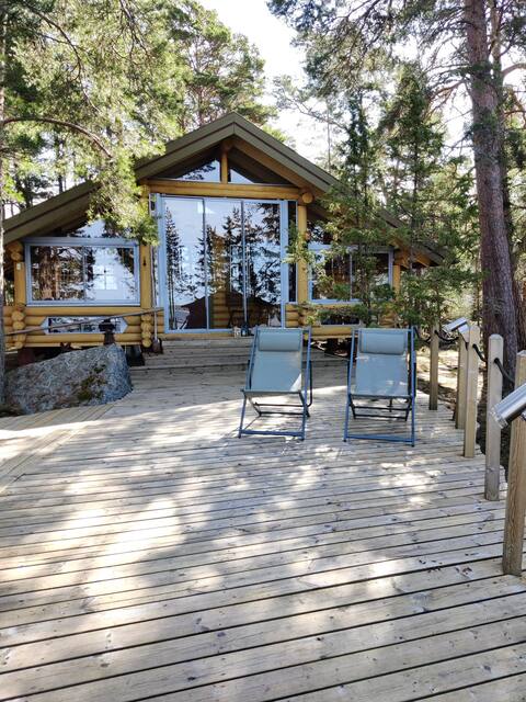 Log cabin by the sea