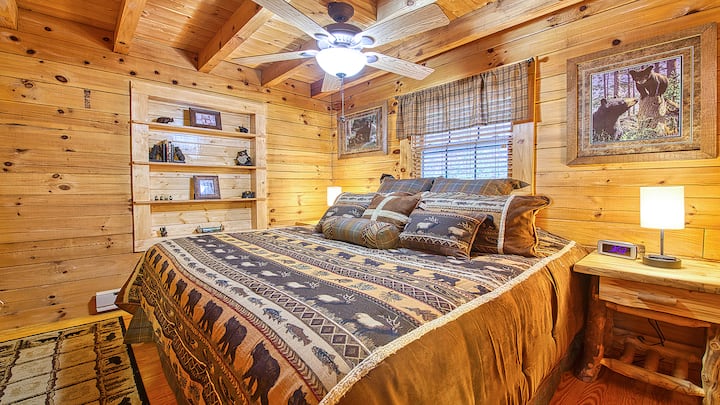 First Level Bedroom, with closet, dresser in closet, two night stands and TV in Room.