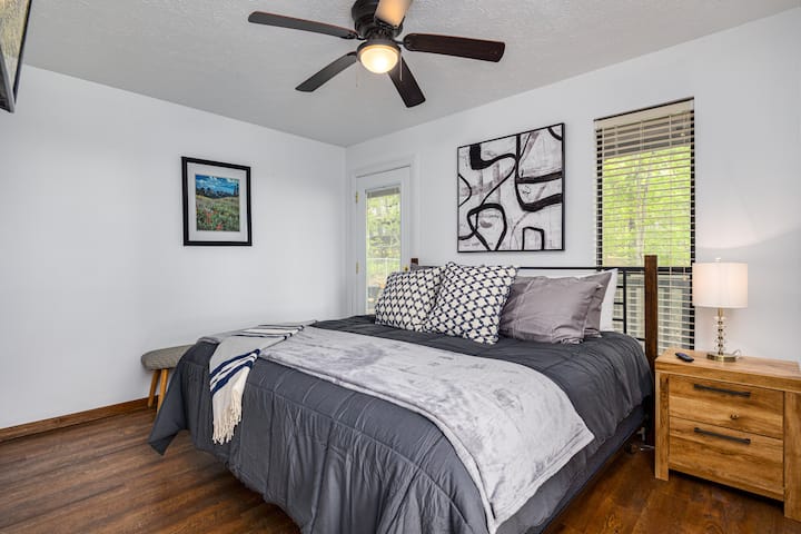 King Bedroom on ground floor with a walkout patio.