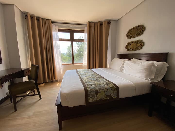 Bedroom with study / working table
Airconditioned