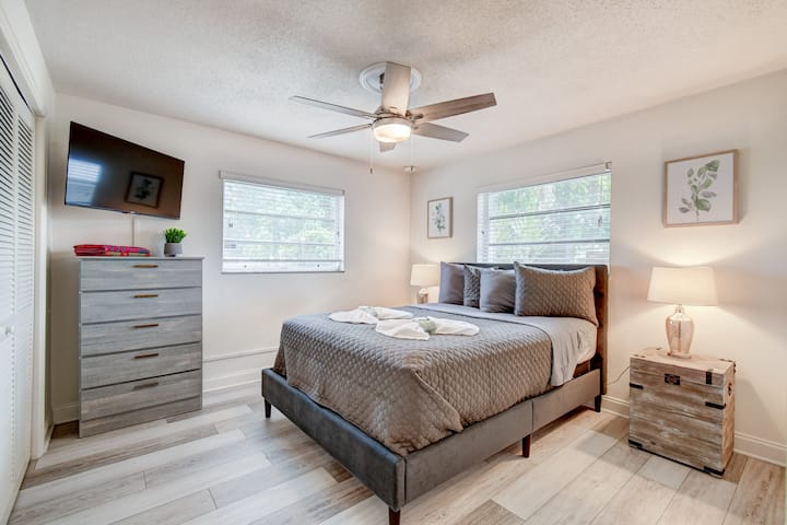 Sunlight streams through the window, illuminating this peaceful bedroom retreat.