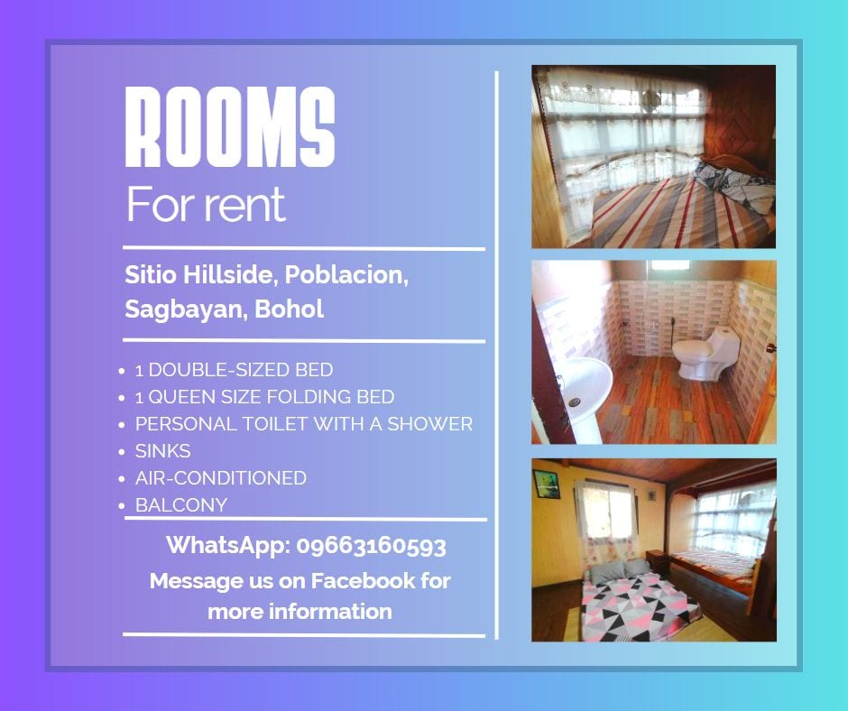 A cozy room features a double-sized bed and a queen-sized folding bed, complemented by air-conditioning. A personal bathroom contains a shower and sink. A balcony offers a view of the surroundings. Bright colors and patterned textiles enhance the welcoming ambiance.