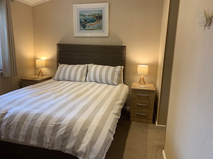 King size bed , walk in wardrobe, large tv , and en suite