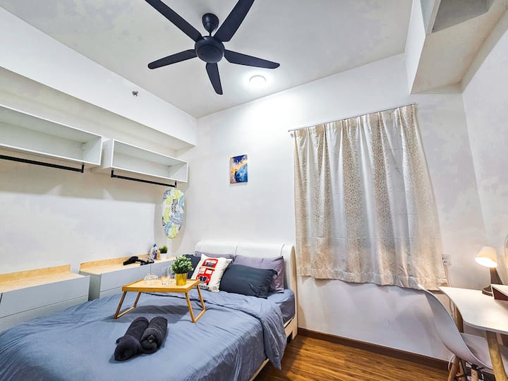 Dormitorio Deluxe con cama queen size y colchón en el piso (bajo petición)