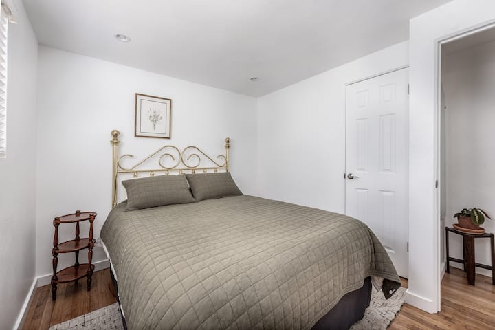 Second bedroom with queen bed + closet