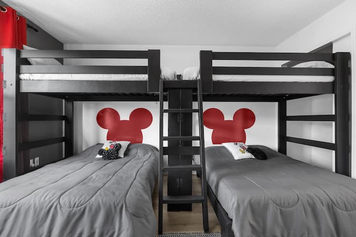 Everyone can fit in this room with a custom made, extra durable bunk bed set; 2 full sized mattresses on the bottom and 2 twin mattresses on top. Equipped with smart TV and its own private bathroom.