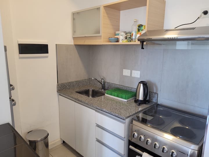 Bright furnished studio in Belgrano with balcony and gym