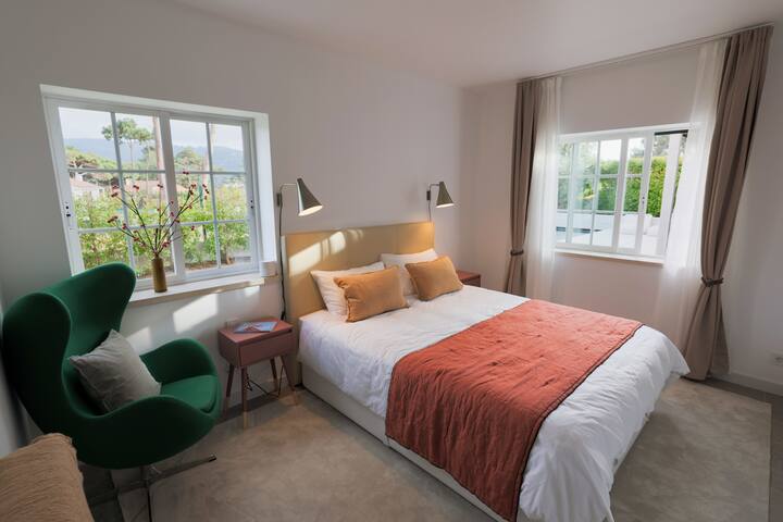 Relaxing home with pine trees, quiet garden & pool gallery image 5