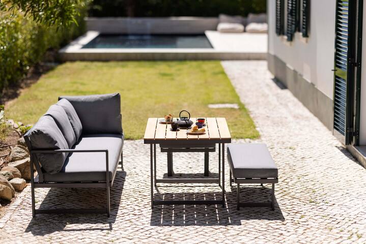 Relaxing home with pine trees, quiet garden & pool gallery image 3