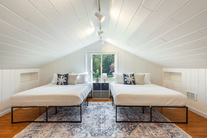 Bedroom #4 is is located above the garage and a short fight of stairs just outside of bedroom #3. It is a great place for the kids to hang out and sleep when it is adult time in the rest of the house. 