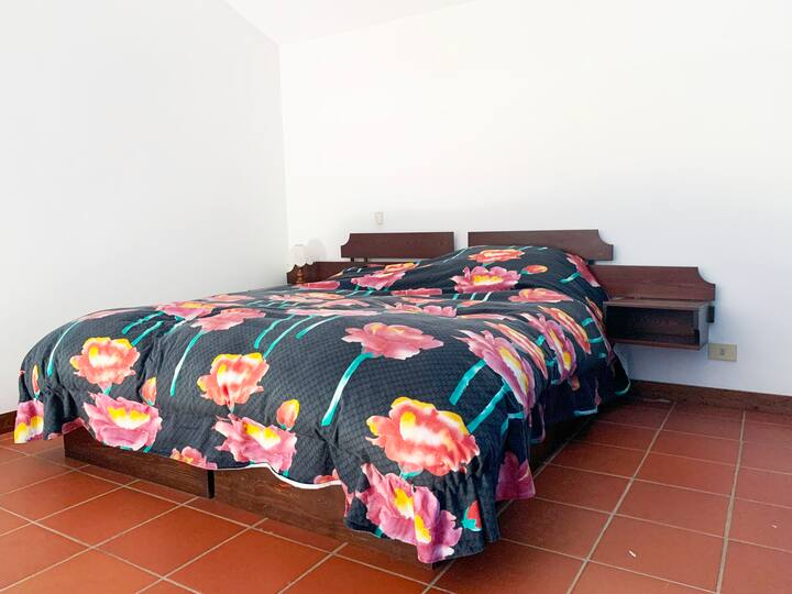 The apartment is set up to accommodate four people and offers a double bed (loft area) and two single beds (lower floor).