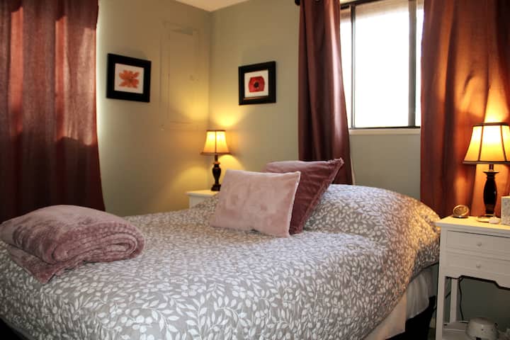 "A haven of comfort and solitude: The private queen bedroom at Simple Pleasures Retreat, providing a cozy space for relaxation and uninterrupted bliss."