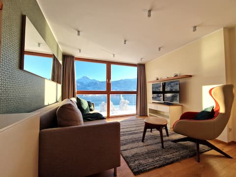 Successful Airbnb property: Modern and spacious flat directly at the lake in Finkenstein Am Faaker See