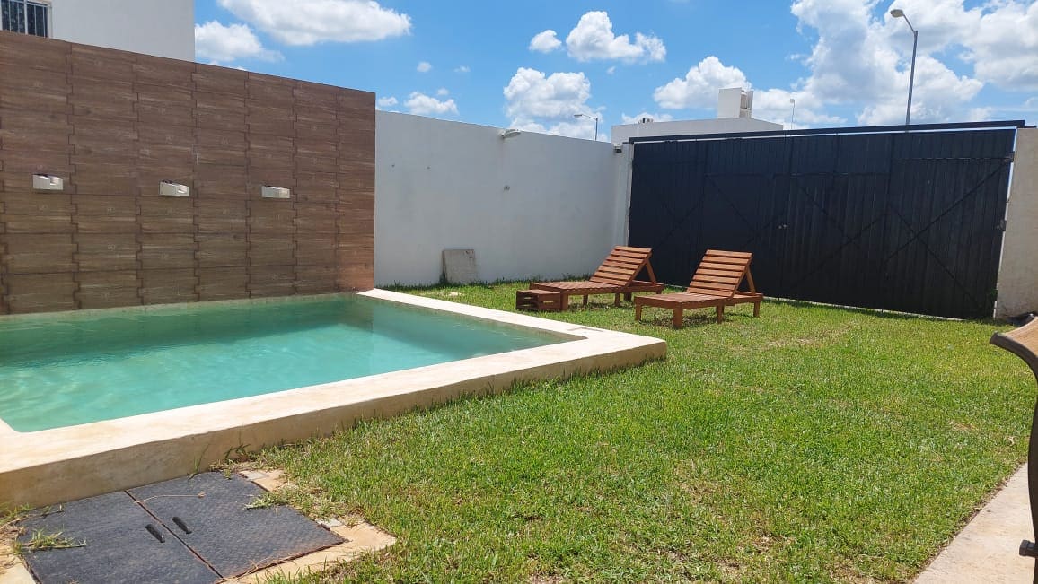 Propiedad de Airbnb exitosa: Family house with 2 bedrooms and access to the pool en Fraccionamiento Sian Kaan Iv