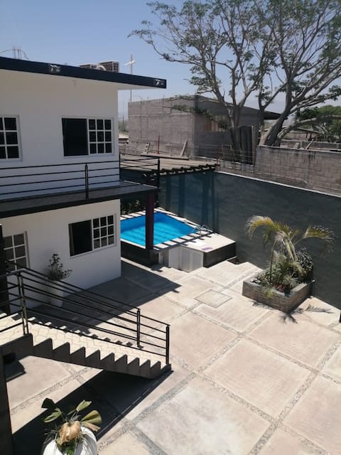 O4 Enjoy Omega Condominiums near the beach