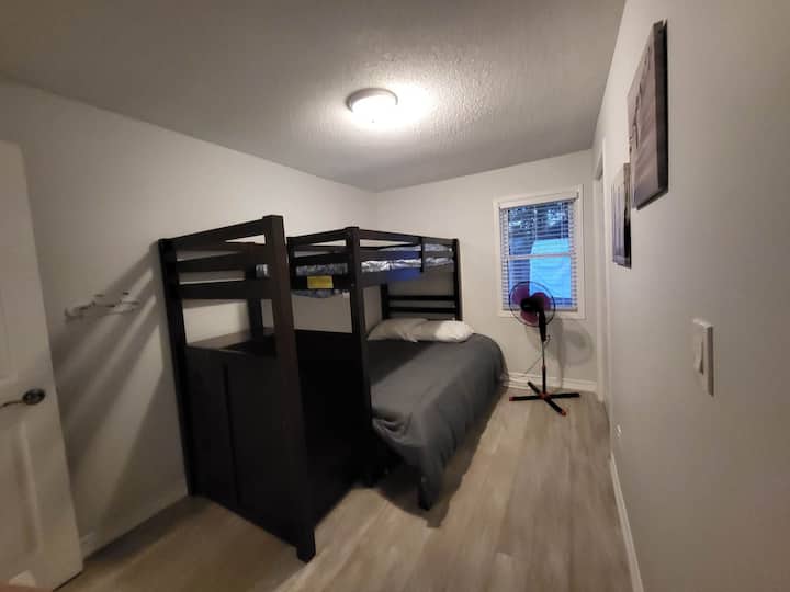 Bunk room with Fan and clothes hooks