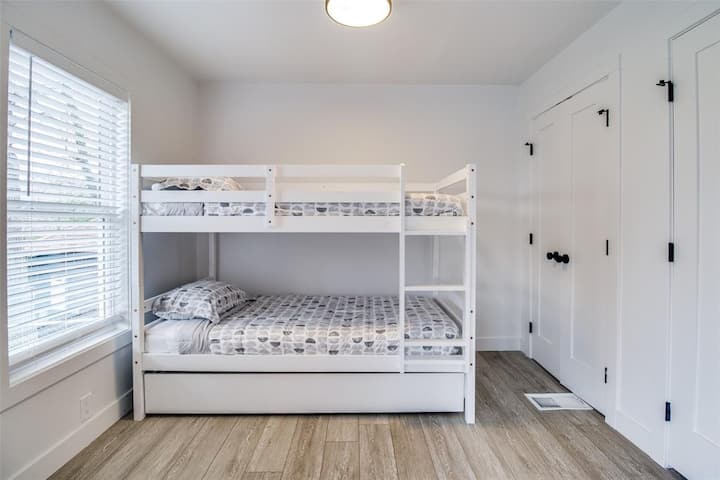 Upstairs bedroom with Bunk Beds and a pullout trundle bed (sleeps 3 or more if smaller children)