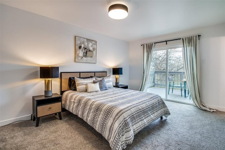 Master Suite w/ direct back deck access and large glass door views