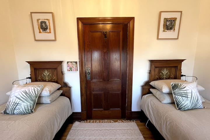 The Austrian twin bedroom is the smallest upstairs.