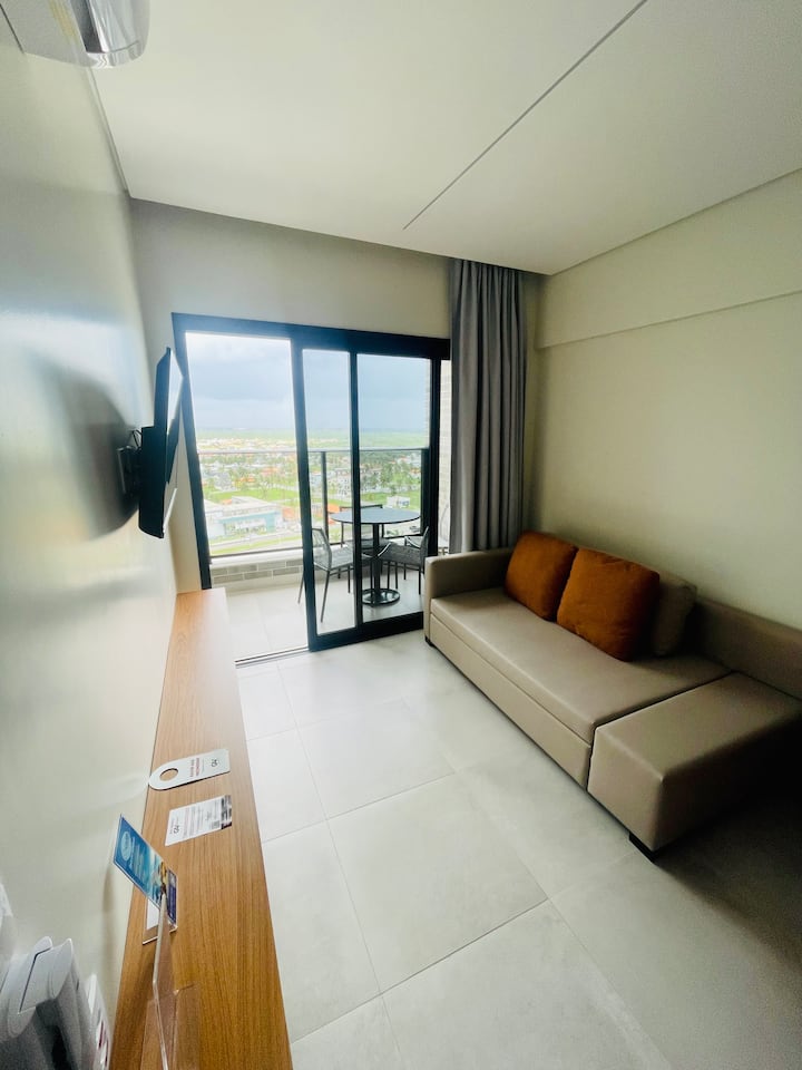 Room with sofa bed, and Smart TV