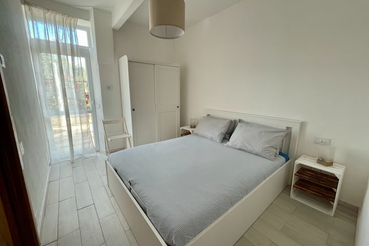 chambre double avec porte-fenêtre de jardin