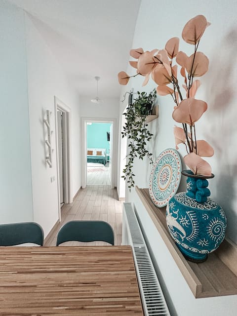 CozyChic Papaya Apartment