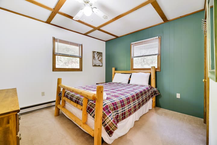 Bedroom 1 Upstairs- Full bed with bureau, ceiling fan and TV