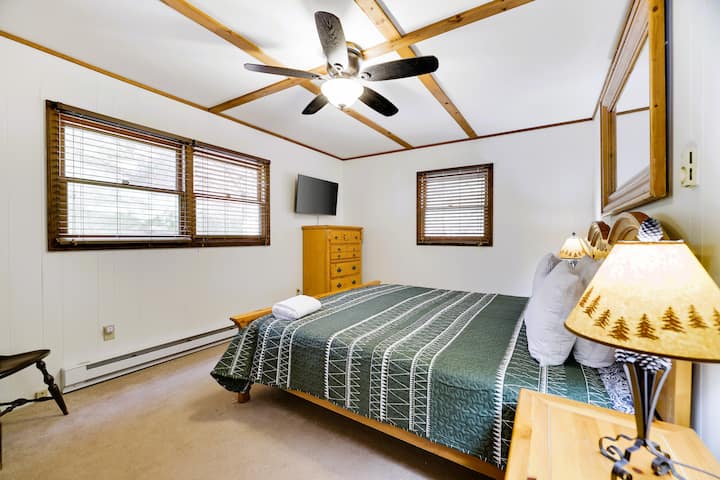 Bedroom 3 - Downstairs with  King bed ceiling fan, bureau, double closet with portable pack&play, smart TV