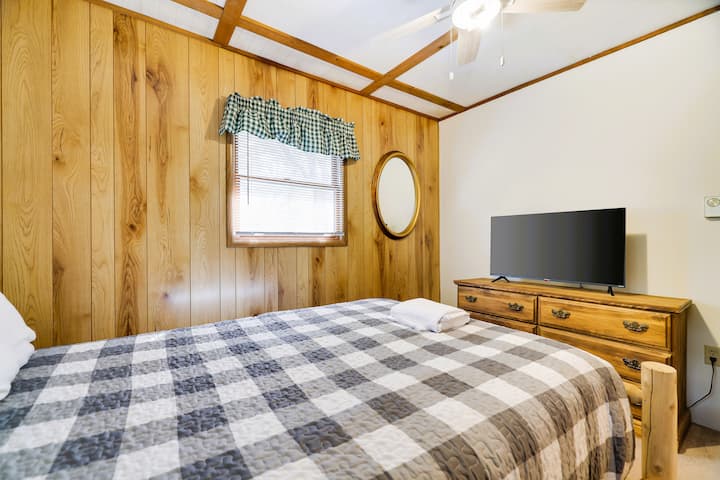 Bedroom 2 Upstairs- Queen bed with bureau, ceiling fan and Smart TV.  Washer and Dryer in the closet