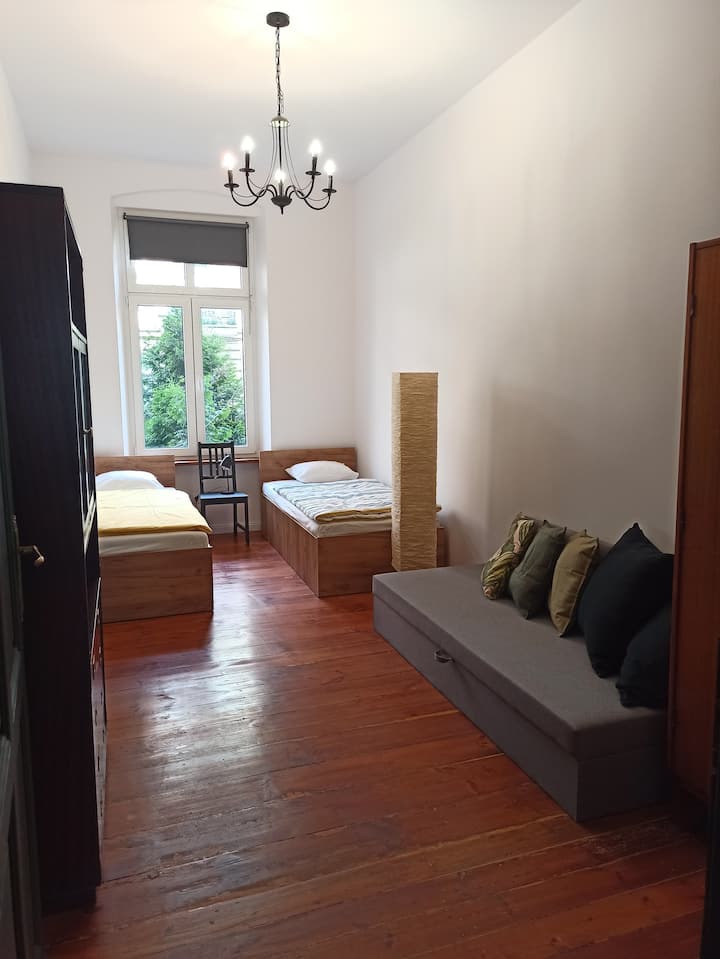 dormitorio medio 3 camas