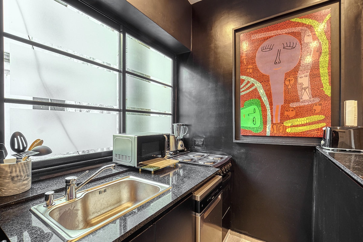 cooktop visible next to the sink