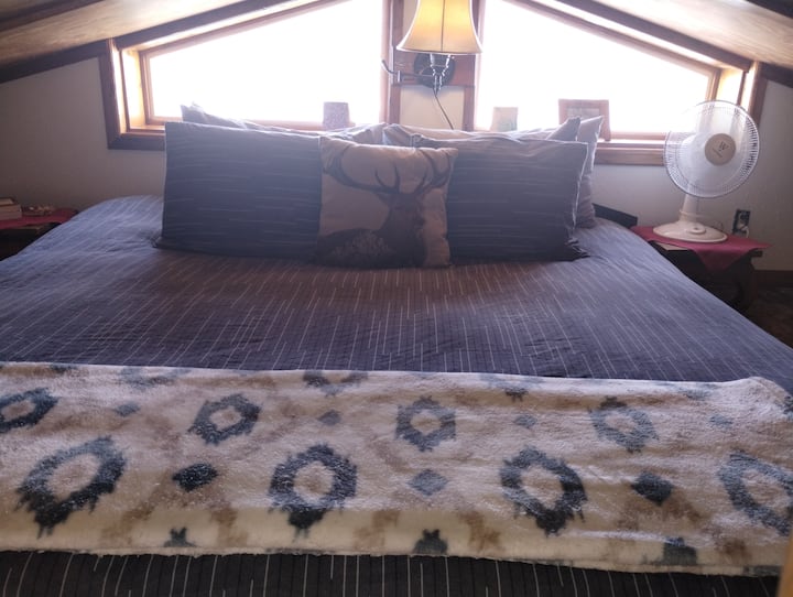 Rest and relaxation time in comfy king bed.