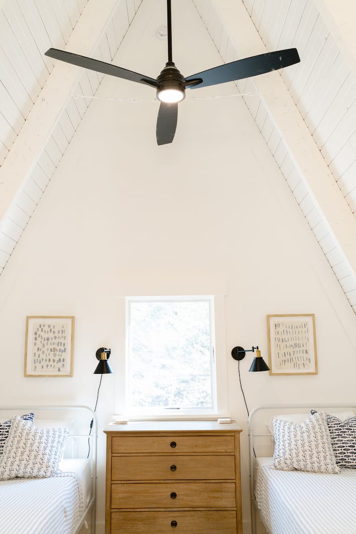 Stairs lead up to a 2nd bedroom open loft