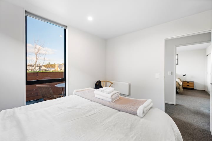 Bdrm2, SE view to Mt Iron across Outlet Rd to Hikuwai housing Estate, & Bdrm1 across the passage..