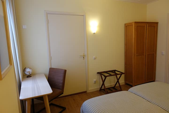 The door in this photo is a shared door with the breakfast room of the behind Hotel. This door is closed during your stay. 