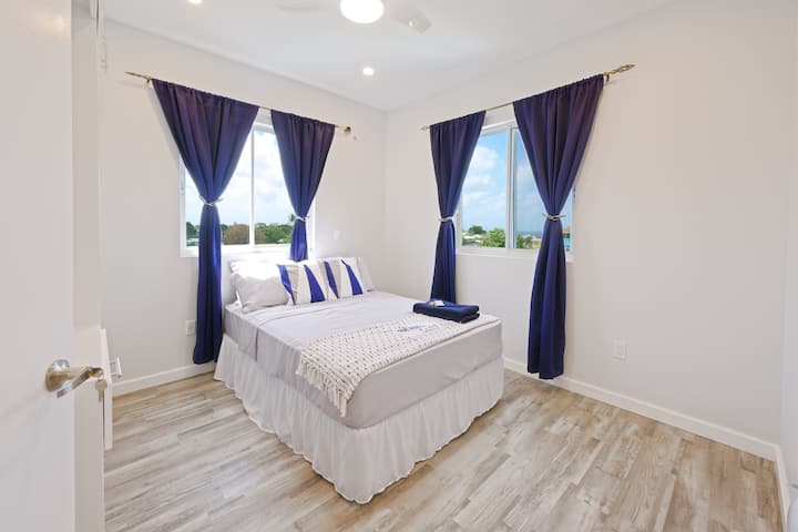 Bedroom #2 Full bed that sleeps up to two persons. There are built in cupboards with drawers and hanging spaces as well as countertop space. 