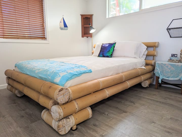 Main Floor Bedroom - Beautiful Elephant Bamboo Bedframe. All New 100% Cotton Sheets.