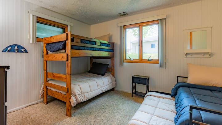 Lower level bedroom with bunk beds & trundle bed. Sleeps 4