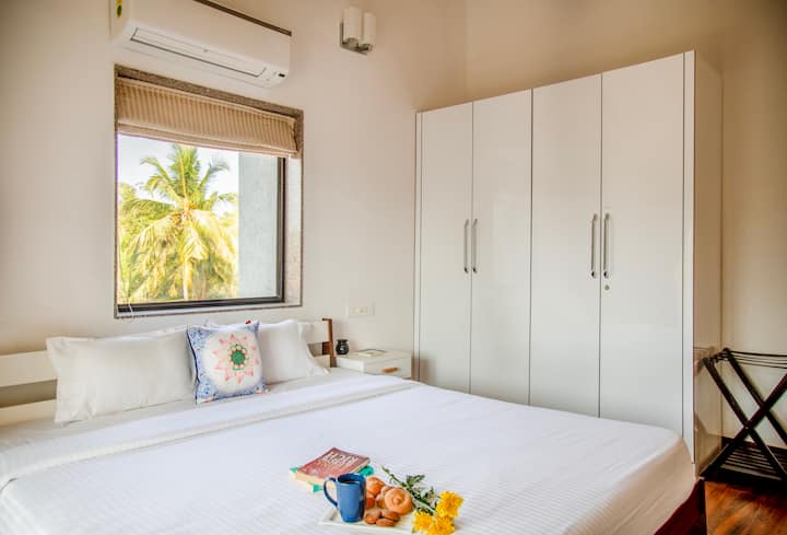 Ground floor bedroom with TV