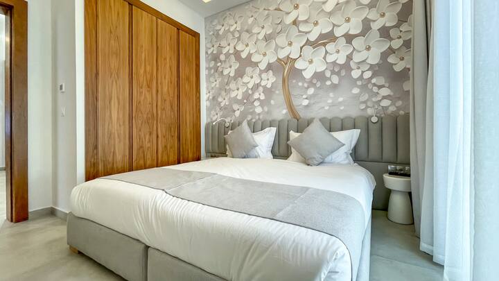 The second bedroom of Villa AMELIA consists of a double bed, with storage closet as well as TV with cable channels.