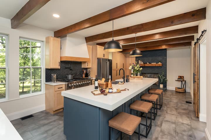 Gather around: A welcoming kitchen table set with chairs, inviting you to share memorable meals and moments together